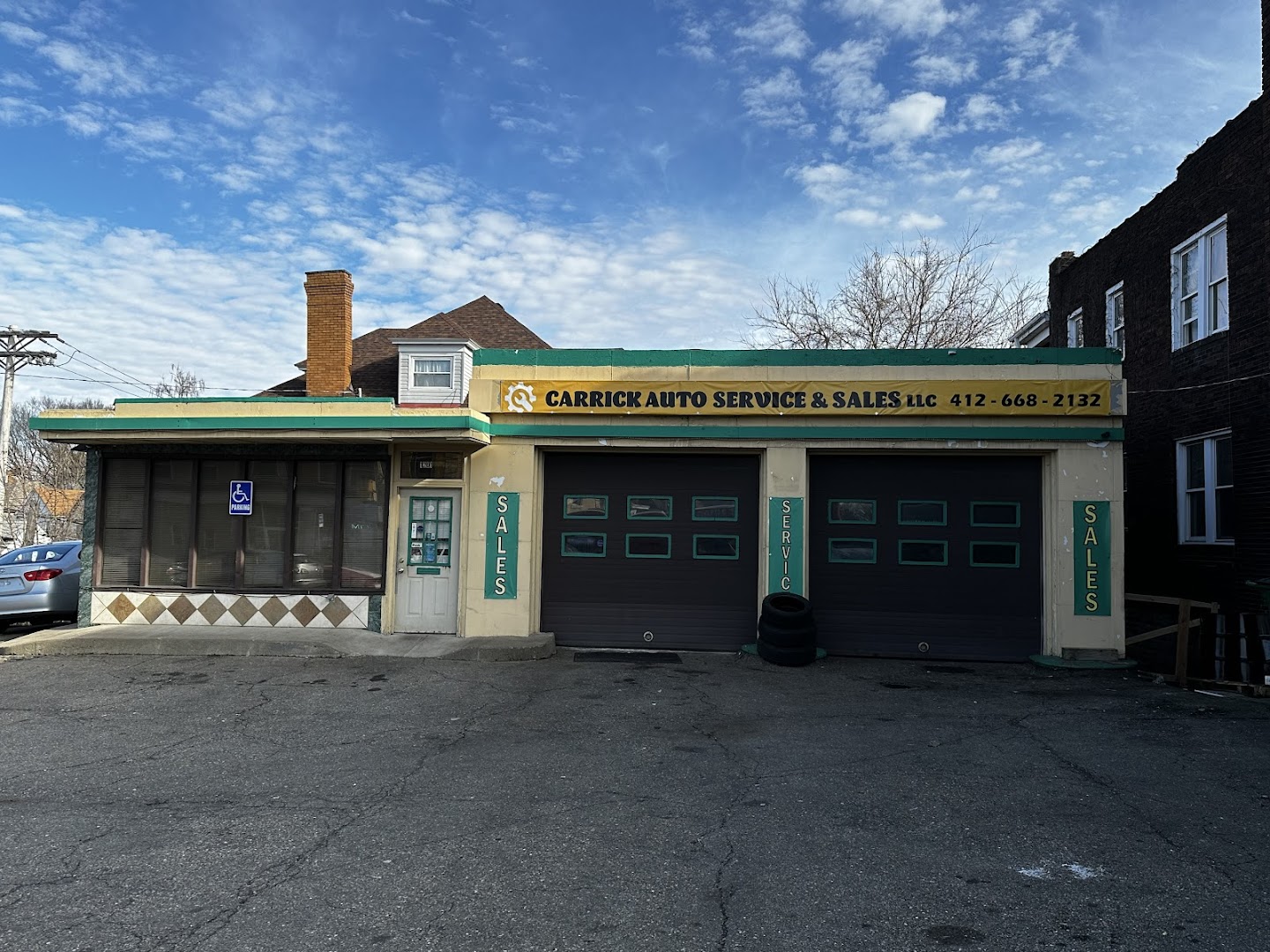 Exterior storefront of Carrick Auto Service and Sales LLC on Brownsville Road